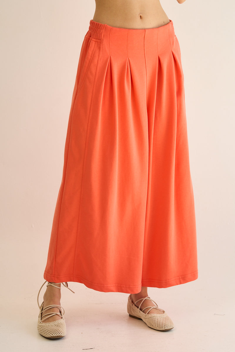 The Greii Flowy Front Pleated Pants Coral 30a