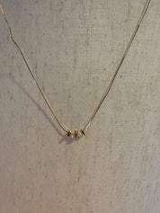 Gold and White Beaded Necklace