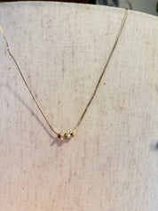 Gold and White Beaded Necklace