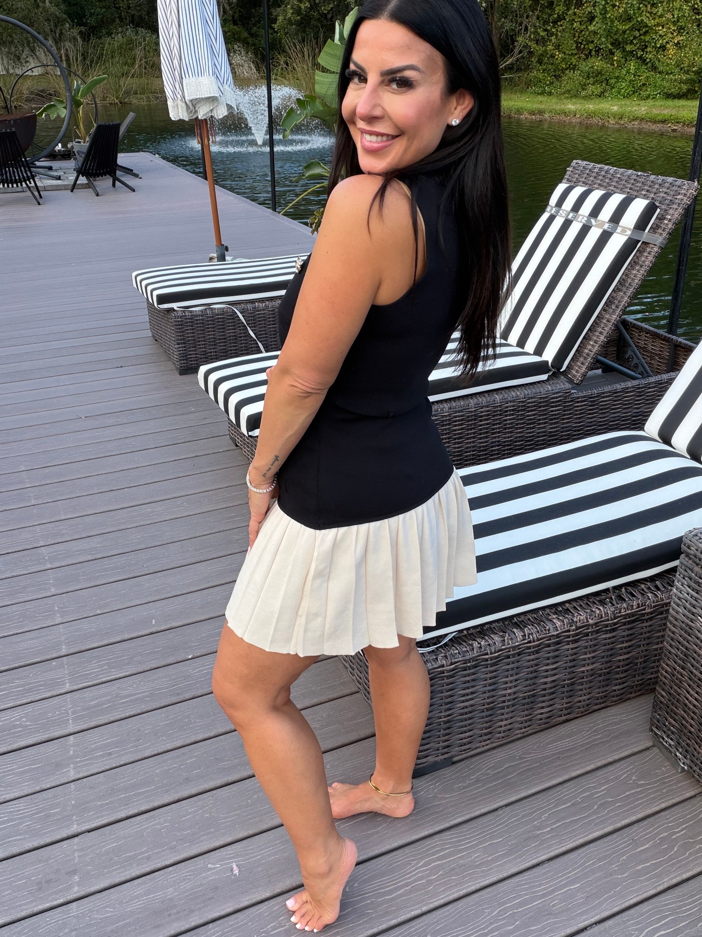 Chic Black and Cream Knit Pleated Mini Dress