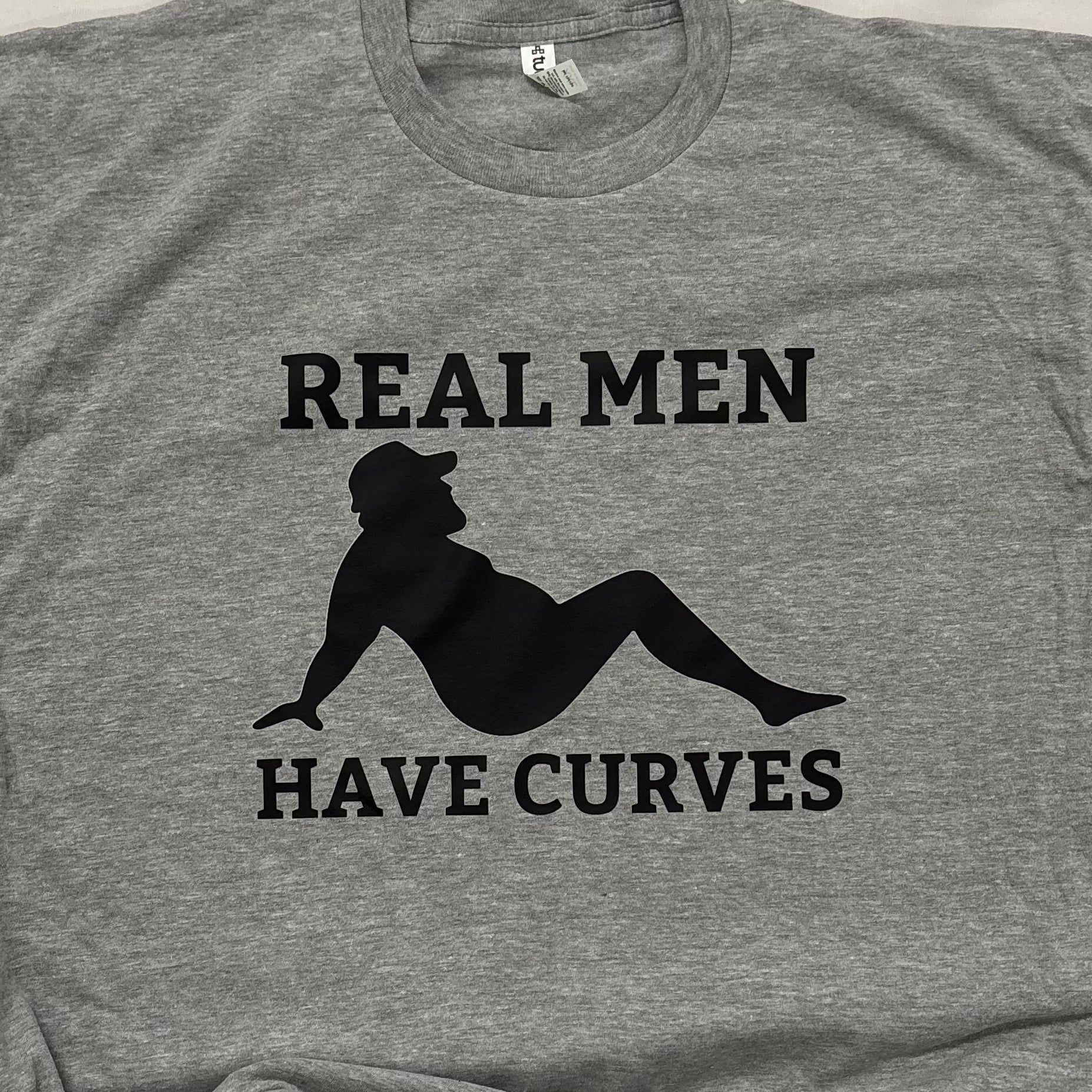 *Real Men Have Curves Graphic Tee