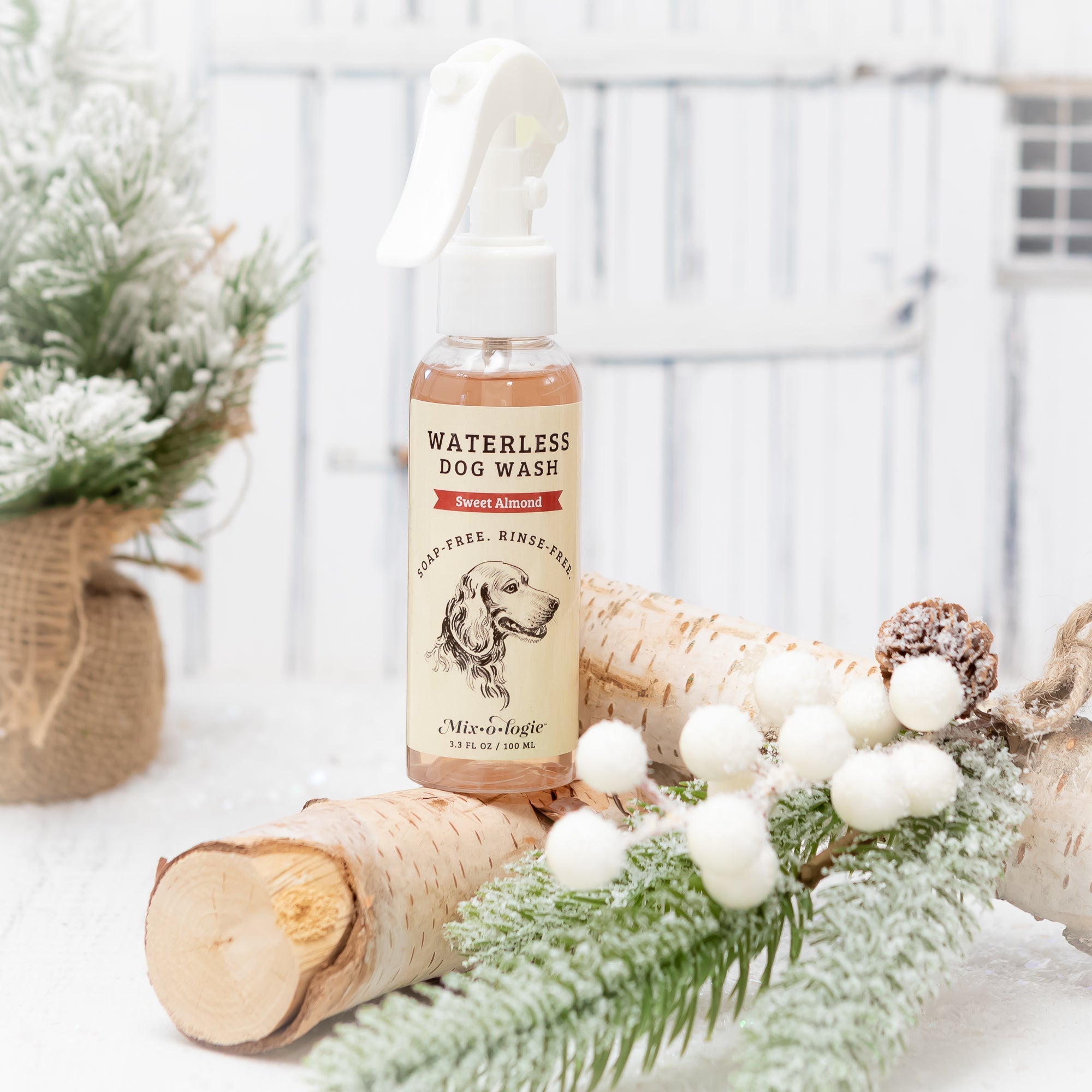 WDW-ALMOND_waterless_dog_wash_styled_for_christmas_and_winter_with_wood_sticks_greenery_and_mini_snowballs_with_snow_like_glitter.jpg